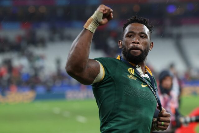 South Africa captain Siya Kolisi celebrates his side's victory in the Rugby World Cup fina