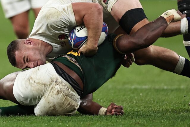 South Africa captain Siya Kolisi tackles England's Ben Earl in an 'ugly' but dramatic Worl