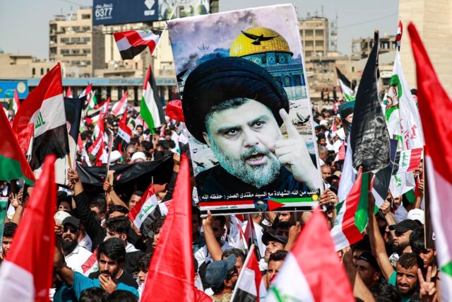 Supporters of Iraqi Shiite cleric Moqtada al-Sadr gather at Baghdad's Tahrir Square during