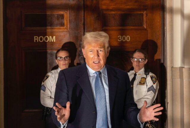 Former US president Donald Trump addresses the media before leaving the courthouse for the