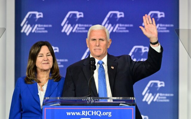 Former US vice president and Republican presidential candidate Mike Pence, with his wife K