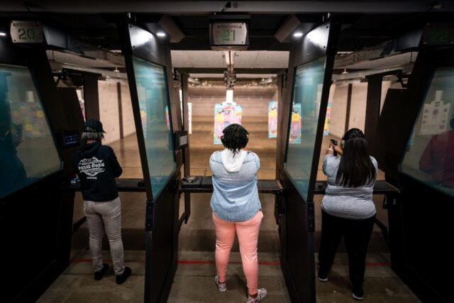 Women attend a training session with "A Girl & A Gun" women's shooting league in Owings M