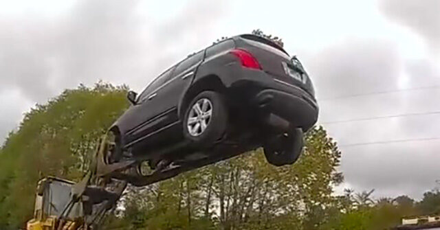 WATCH - 'Genius!': Ohio Car Shop Worker Nabs Alleged Thief with Forklift
