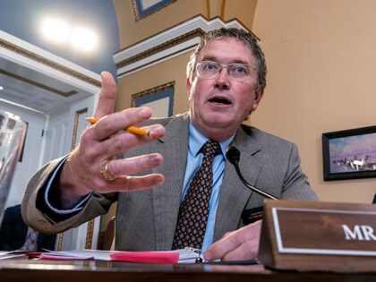 Rep. Thomas Massie, R-Ky., joined at right by Rep. Ralph Norman, R-S.C., both members of t