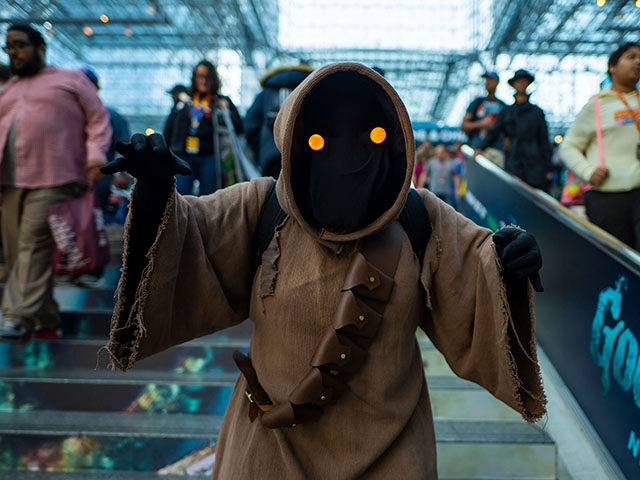 An attendee dressed as a Jawa from Star Wars poses during New York Comic Con at the Jacob