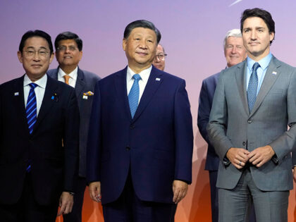 Japan's Prime Minister Fumio Kishida, Chinese President Xi Jinping and Canada's Prime Mini