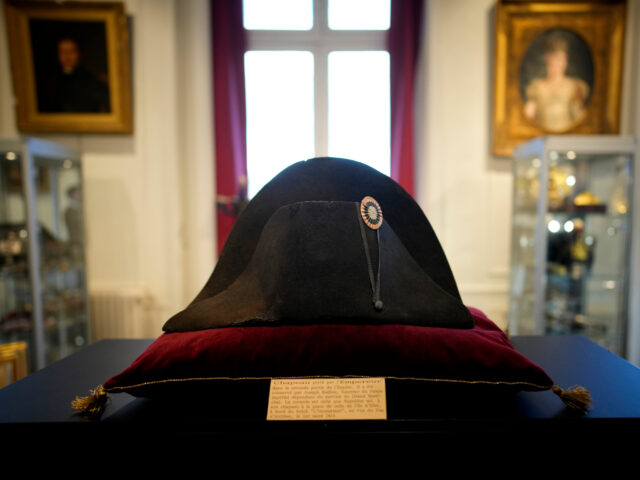 One of the signature broad, black hats that Napoléon wore when he ruled 19th century France and waged war in Europe is on display at Osenat's auction house in Fontainebleau, south of Paris, Friday, Nov. 17, 2023. The hat is tipped to fetch more than half a million euros (dollars) …