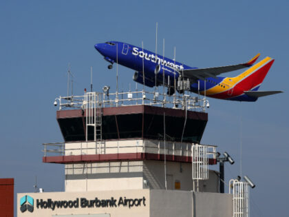 BURBANK, CALIFORNIA - SEPTEMBER 25: A Southwest Airlines take off past the control tower a