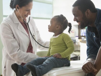 Child with doctor at hospital