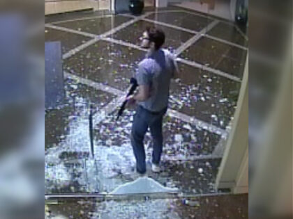 This surveillance video provided by the Louisville Metro Police Department shows bank empl