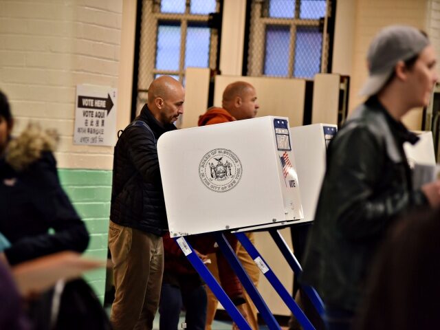 NEW YORK, NY - NOVEMBER 6: Voters cast their ballots on Election Day at P.S. 69 on Novemb