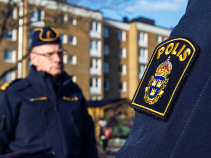 Police officers patrol in the Rosengard district of Malmo, Sweden, on Wednesday, Jan. 23,