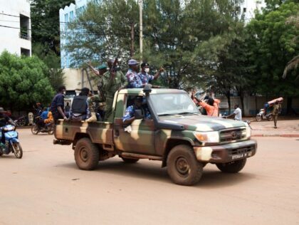 Malian soldiers drive through the streets of Bamako, Mali on August 19, 2020, the day afte