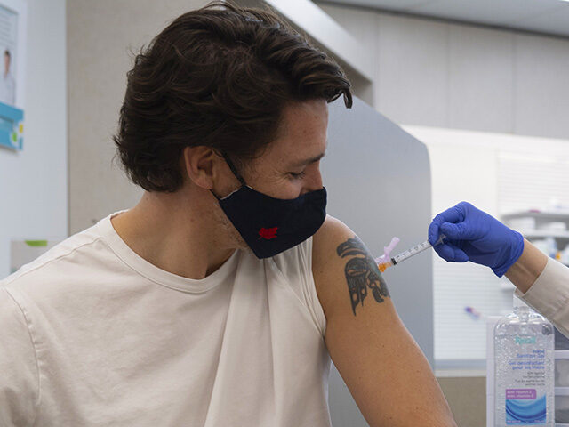 Justin Trudeau, Canada's prime minister, receives a dose of the AstraZeneca Covid-19