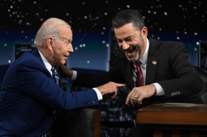 TOPSHOT - US President Joe Biden speaks with host Jimmy Kimmel as he makes his first in-pe