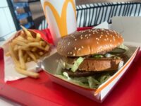 A tray with Big Mac, french fries and Coca-Cola is seen on a table in this illustration photo taken in McDonald's restaurant in Krakow, Poland on November 9, 2022. (Photo by Jakub Porzycki/NurPhoto via Getty Images)