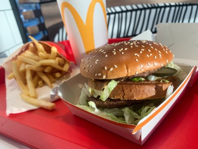 A tray with Big Mac, french fries and Coca-Cola is seen on a table in this illustration ph