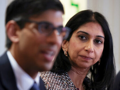 ROCHDALE, ENGLAND - APRIL 3: British Prime Minister Rishi Sunak (L) and Home Secretary Suella Braverman (R) attend a meeting with the local community and police leaders, following the announcement of a new police task force to help officers tackle grooming gangs, on April 3, 2023 in Rochdale, England. (Photo …