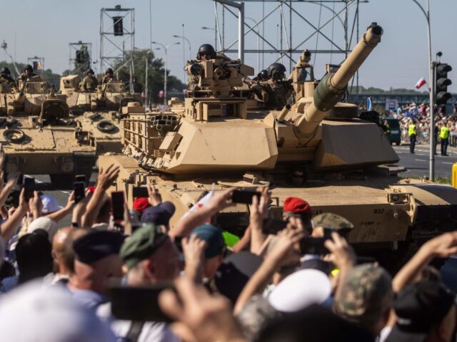 US-made Abrams tank are seen as they take part in a military parade in Warsaw on Polish Ar