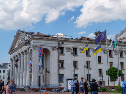 CHERNIHIV, UKRAINE - AUGUST 19: Flags of Ukraine and EU flutter on the flagpoles in front