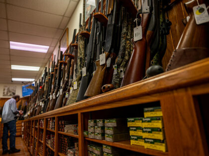 Customers shop for firearmsin the McBride Guns Inc. store on August 25, 2023 in Austin, Te