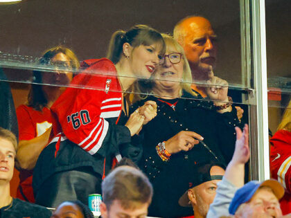 Taylor Swift and Donna Kelce talk before the game between the Kansas City Chiefs and the D