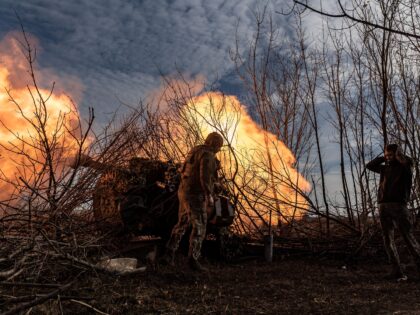 DONETSK OBLAST, UKRAINE - NOVEMBER 03: Ukrainian soldiers fire artillery at their fighting