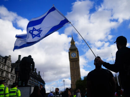 People take part in a pro-Israel rally in Parliament Square in London. Picture date: Sunda