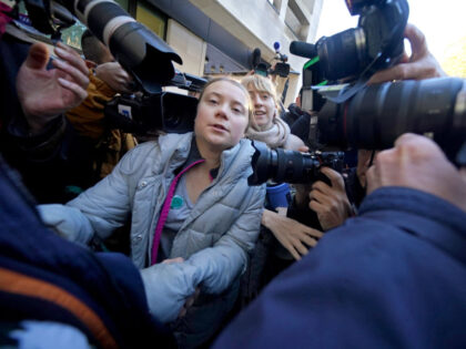 Environmental campaigner Greta Thunberg makes her way through the gathered media as she arrives at Westminster Magistrates' Court, London, where she is charged with failing to comply with a condition imposed under Section 14 of the Public Order Act. The 20-year-old was arrested near the InterContinental Hotel in Mayfair on …