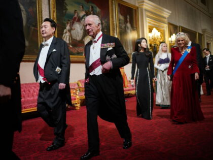 LONDON, ENGLAND - NOVEMBER 21: King Charles III (C) walks with President of South Korea Yoon Suk Yeol (L) as Queen Camilla (R) walks with his wife Kim Keon Hee (3rd R) at the State Banquet at Buckingham Palace on November 21, 2023 in London, England. King Charles is hosting …