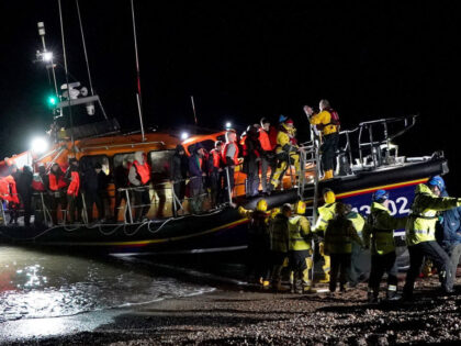 RETRANSMITTING CORRECTING DATE A group of people thought to be migrants are brought in to Dungeness, Kent, onboard the RNLI Dungeness Lifeboat following a small boat incident in the Channel. Picture date: Wednesday November 22, 2023. (Photo by Gareth Fuller/PA Images via Getty Images)