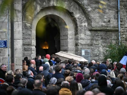 The coffin of Thomas, a teenager who passed away on November 19, 2023 in Crepol after being wounded with a knife during a ball in the small village in the Drome region, is carried during his funerals at the entrance of the Collegiate church of Saint-Donat-sur-l'Herbasse, south-eastern France, on November …