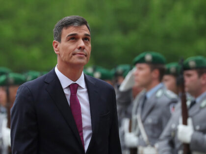 Pedro Sanchez, Spain's prime minister, passes an honor guard as he arrives at the Chancell