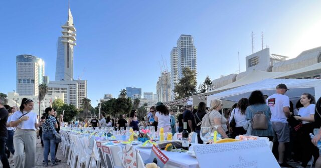 WATCH: Israelis Hold Sabbath Meal in Tel Aviv with Empty Table for Hostages