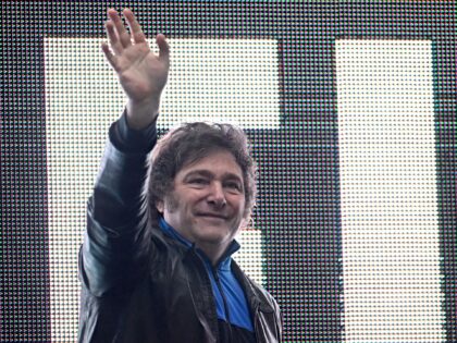 Argentine congressman and presidential candidate for La Libertad Avanza Alliance, Javier Milei, waves to supporters during a campaign rally in Ezeiza, Buenos Aires province, Argentina on November 15, 2023. (Photo by Luis ROBAYO / AFP) (Photo by LUIS ROBAYO/AFP via Getty Images)