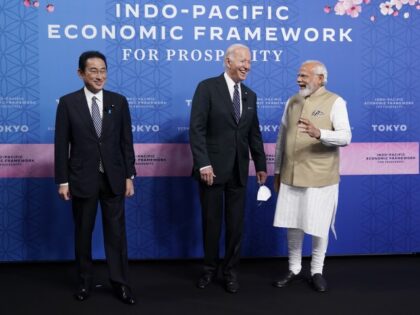 Japanese Prime Minister Fumio Kishida, left, President Joe Biden, and Indian Prime Minister Narendra Modi pose for photos as they arrive at the Indo-Pacific Economic Framework for Prosperity launch event at the Izumi Garden Gallery, Monday, May 23, 2022, in Tokyo. (Evan Vucci/AP)
