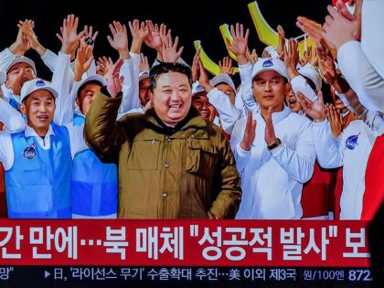 SEOUL, SOUTH KOREA - 2023/11/22: A TV at Seoul's Yongsan Station shows North Korean leader Kim Jong Un and a report that North Korea's reconnaissance satellite, its third launch attempt this year, has entered orbit. North Korea successfully placed a reconnaissance satellite into orbit on November 21 and said it …