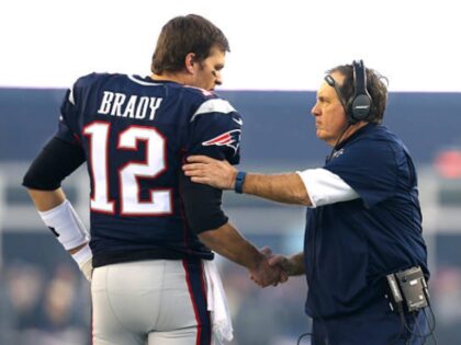 FOXBORO, MA - JANUARY 16: Tom Brady #12 and head coach Bill Belichick of the New England P