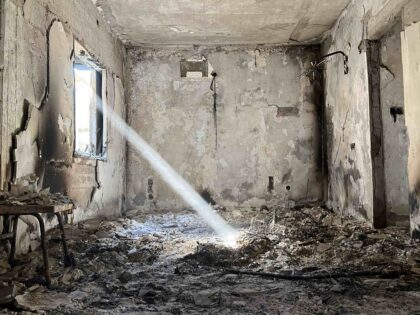 A ray of light shines into the burnt ruin of a house destroyed by Hamas terrorists in the attack of October 7 in Kibbutz Nir Oz, Israel. November 21, 2023 (Joel Pollak / Breitbart News)