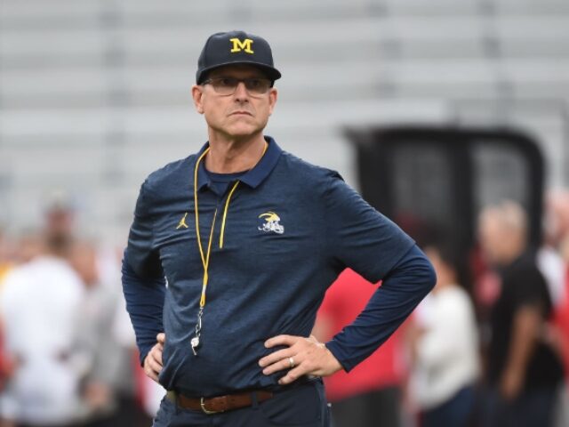 LINCOLN, NE - OCTOBER 9: Head coach Jim Harbaugh of the Michigan Wolverines walks the field before the game against the Nebraska Cornhuskers at Memorial Stadium on October 9, 2021 in Lincoln, Nebraska. (Photo by Steven Branscombe/Getty Images)