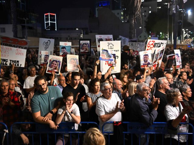 TEL AVIV, ISRAEL - NOVEMBER 25: Families of hostages and their supporters participate in t