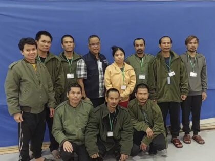 In this photo provided by Thailand's Foreign Ministry, ten of freed Thai hostages and