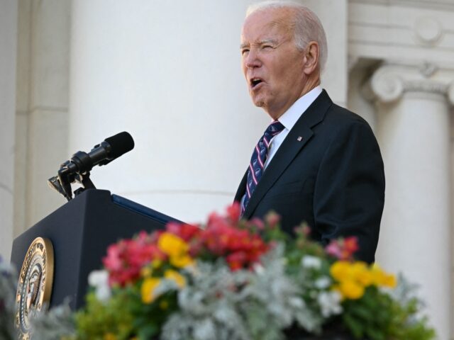 US President Joe Biden speaks at the Memorial Amphitheater in Arlington National Cemetery