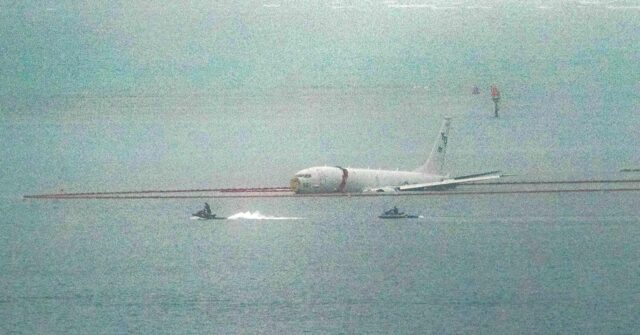 NextImg:Navy Plane Overshoots Hawaii Runway, Splashes into Sea: All Crew Safe