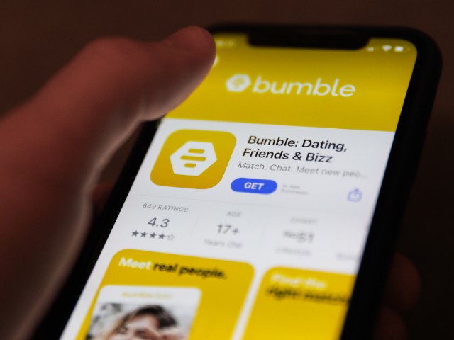Bumble dating app logo on the App Store is seen displayed on a phone screen in this illustration photo taken in Poland on February 21, 2021 (Photo illustration by Jakub Porzycki/NurPhoto via Getty Images).