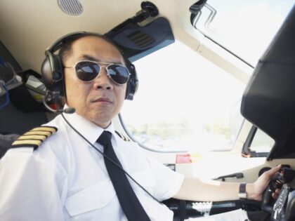 pilot in cockput of airplane