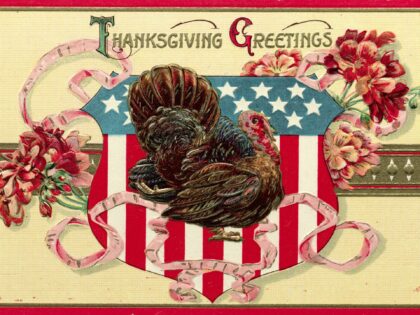 Original Caption) Postcard has a turkey on a shield with the American flag on it and reads "Thanksgiving Greetings." Undated.