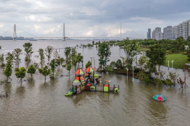 This aerial photo taken on July 28, 2020 shows a flooded sports ground along the Yangtze R