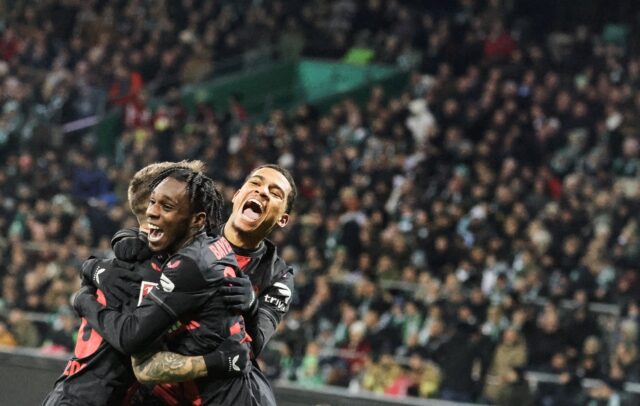 Alex Grimaldo (L) and Jeremie Frimpong (C) scored as Bayer Leverkusen return to the top of