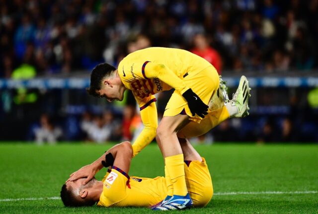 Barcelona midfielder Pedri (R) made his return from injury against Real Sociedad and Xavi